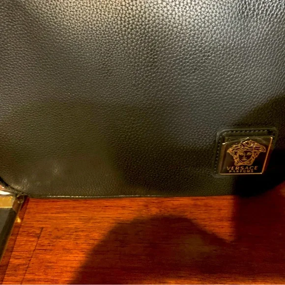 Brand new authentic cosmetic Versace case with 2 zipper compartments with handle
